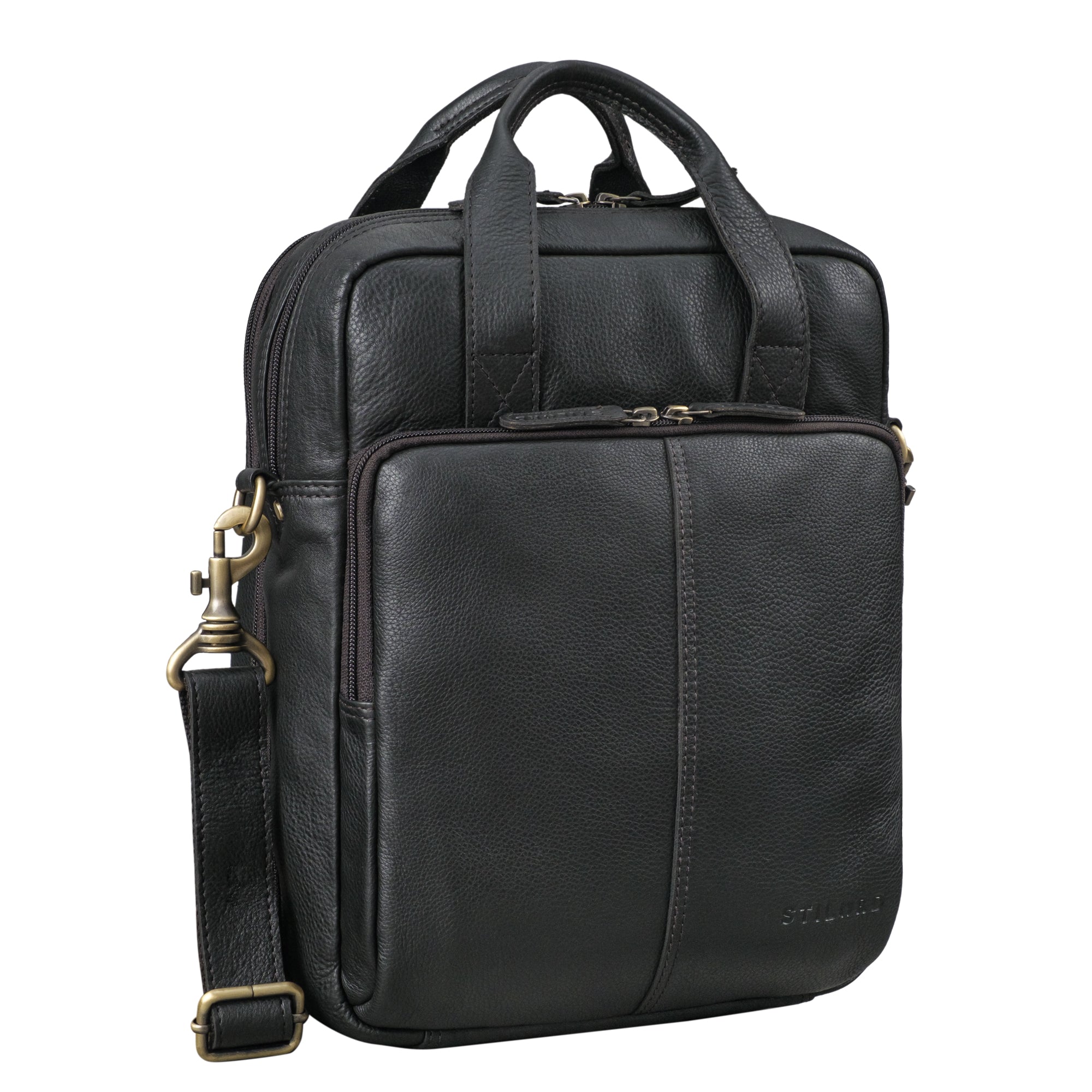 schwarze Ledertasche und Handgepäck